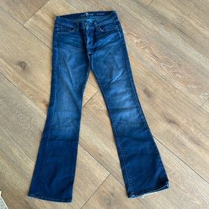7 for all mankind. Bootcut. Gems on pockets. Side 28.